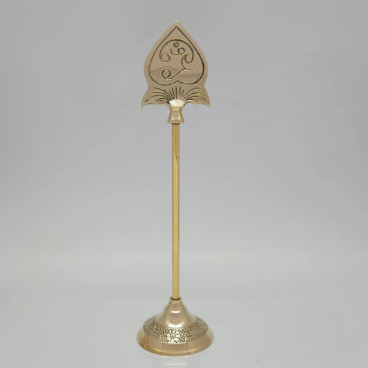 Full length portrait view of a tall pure brass Lord Murugan Vel stand highlighting the long central rod and structured leaf-shaped spear head.