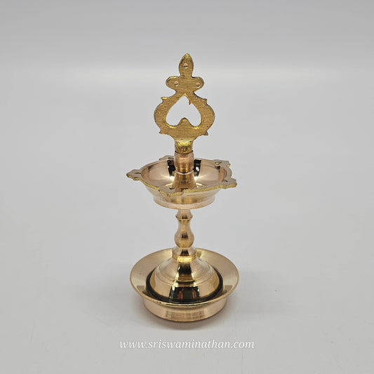 Light up your festivals with this traditional kutthu vilakku