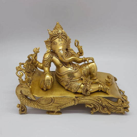 Premium Antique Brass reclining Ganesha statue 27cm length top down aerial perspective view showing mattress spacing and crown alignment layout