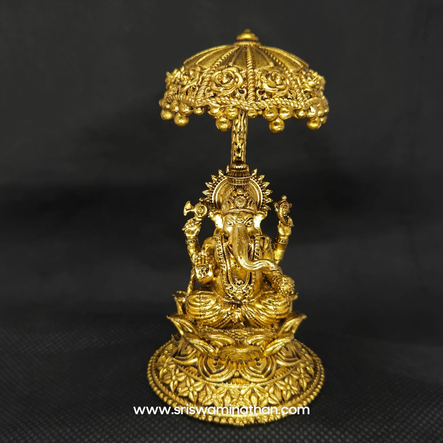 Ganesha seated Under Umbrella Dome