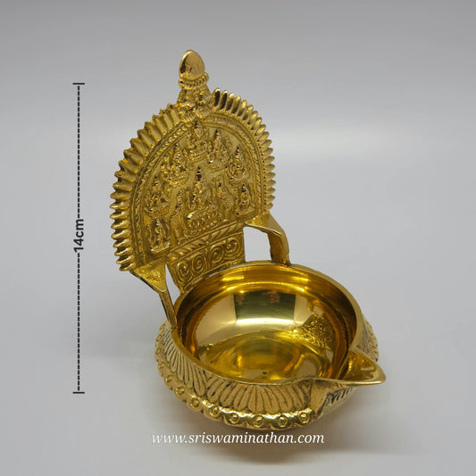 Three-quarter front left perspective view of the solid brass Ashtalakshmi lamp showing the sharp vertical ridge lines on the outer rim with height measurement marker.