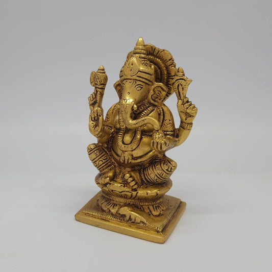 Sri Swaminathan and Co brass Lambodara Vinayaka statue antique finish 1kg weight 45 degree left pose corner view highlighting chiseled pasha noose attribute and ear profiles