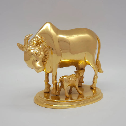 Sri Swaminathan and Co pure brass heavy Kamadhenu cow statue 2.25kg 45 degree left pose corner view highlighting the chiseled neck bell collar detail