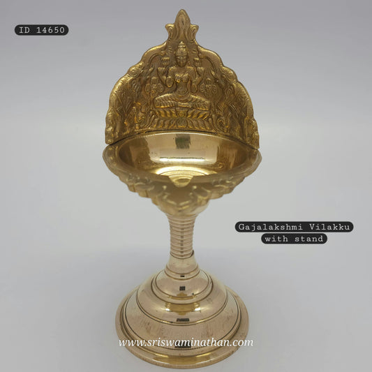 Traditional Gaja Lakshmi brass lamp from Tamil Nadu - Standing vilakku with elephant motifs for pooja room"