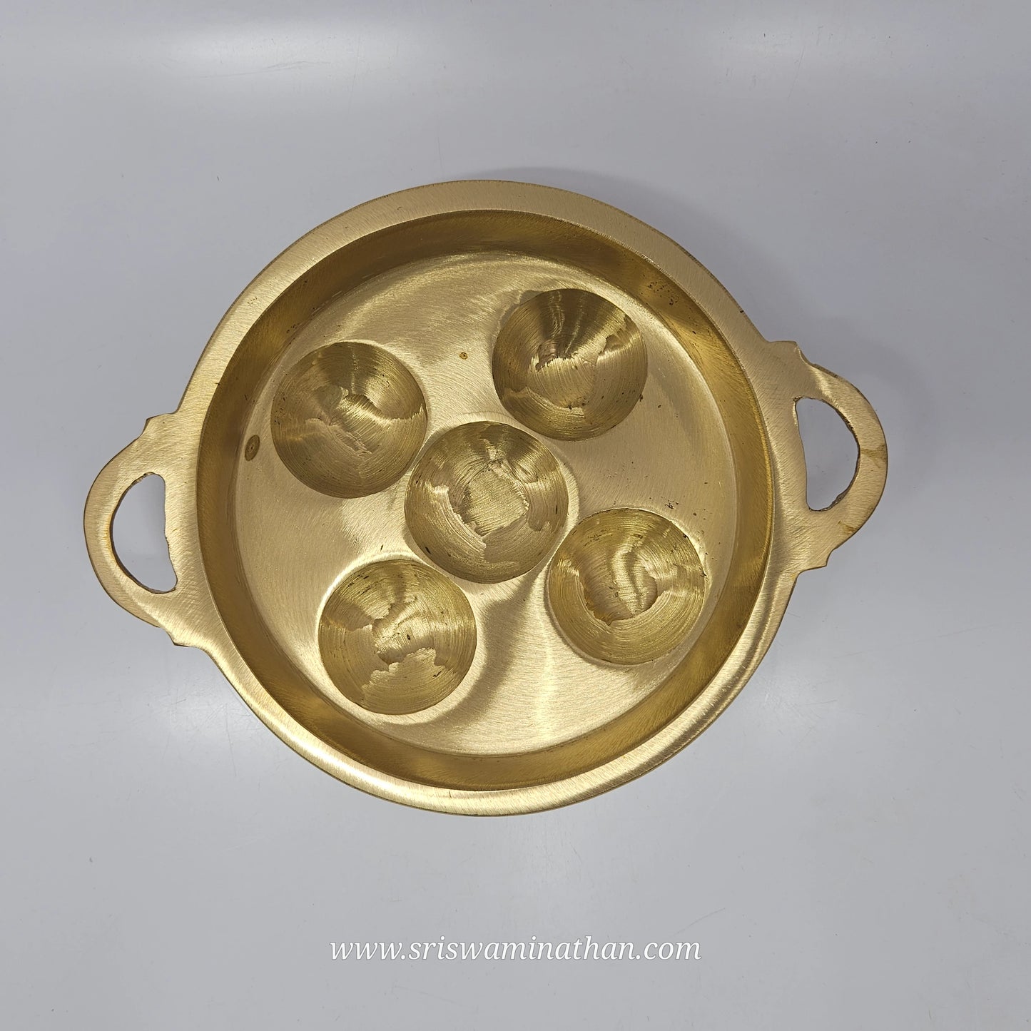 Bronze kuzhi paniyarakal