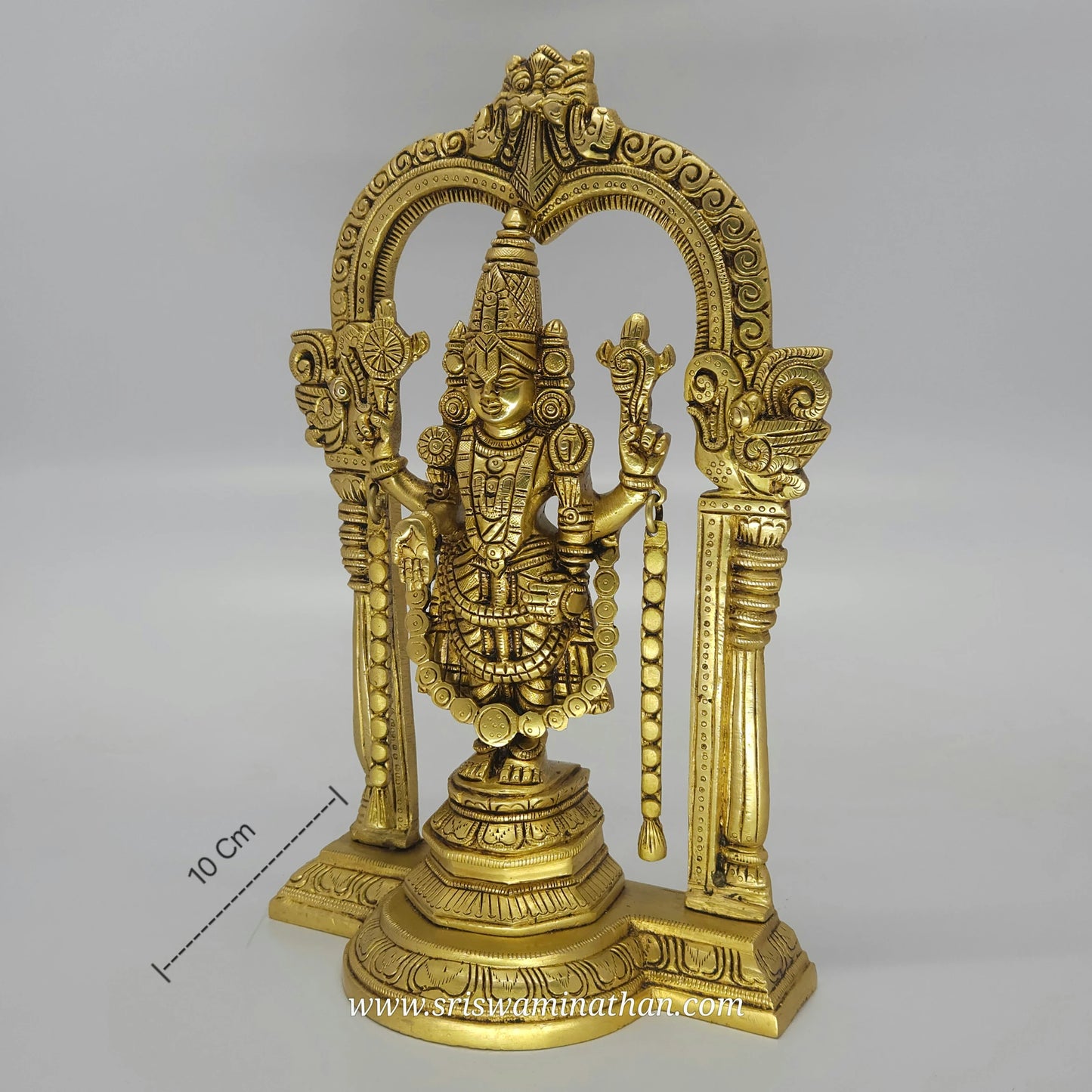 Side view of Venkateswara Balaji statue showcasing traditional South Indian brass work