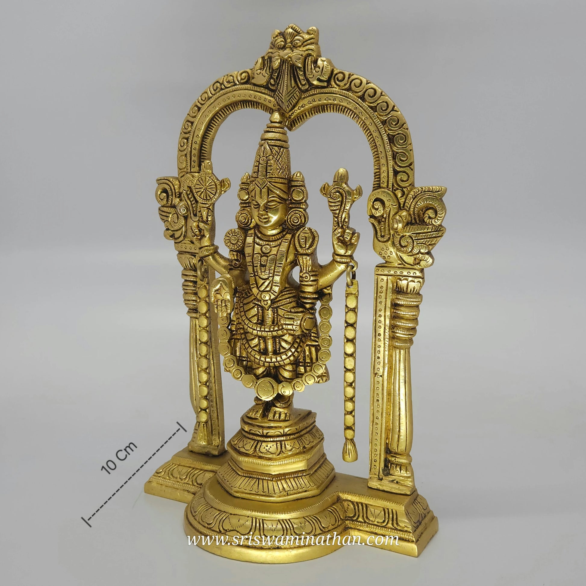 Side view of Venkateswara Balaji statue showcasing traditional South Indian brass work
