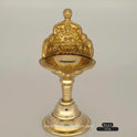 Close-up view of Gaja Lakshmi brass lamp showing intricate elephant and goddess details