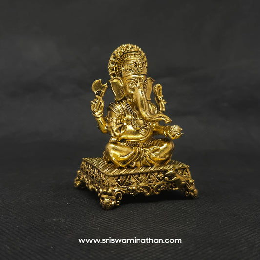 Ganesha on Carved Throne