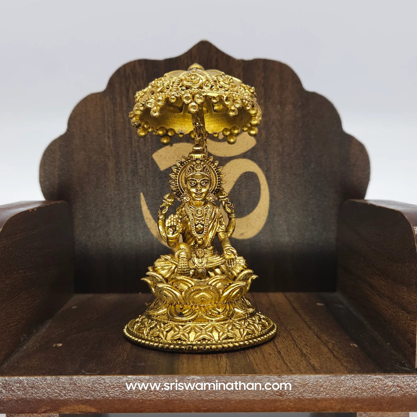 Lakshmi seated Under Umbrella Dome