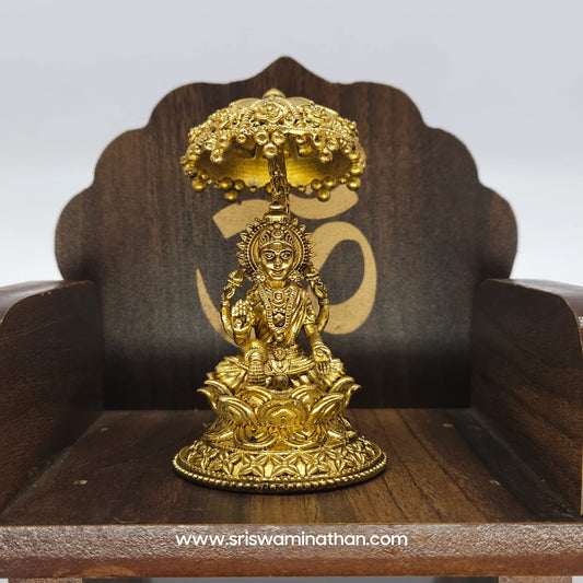 Lakshmi seated Under Umbrella Dome