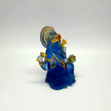 Beautiful turned view of the 6-inch frosted blue glass look Ganesha murti showing the light passing through the back.