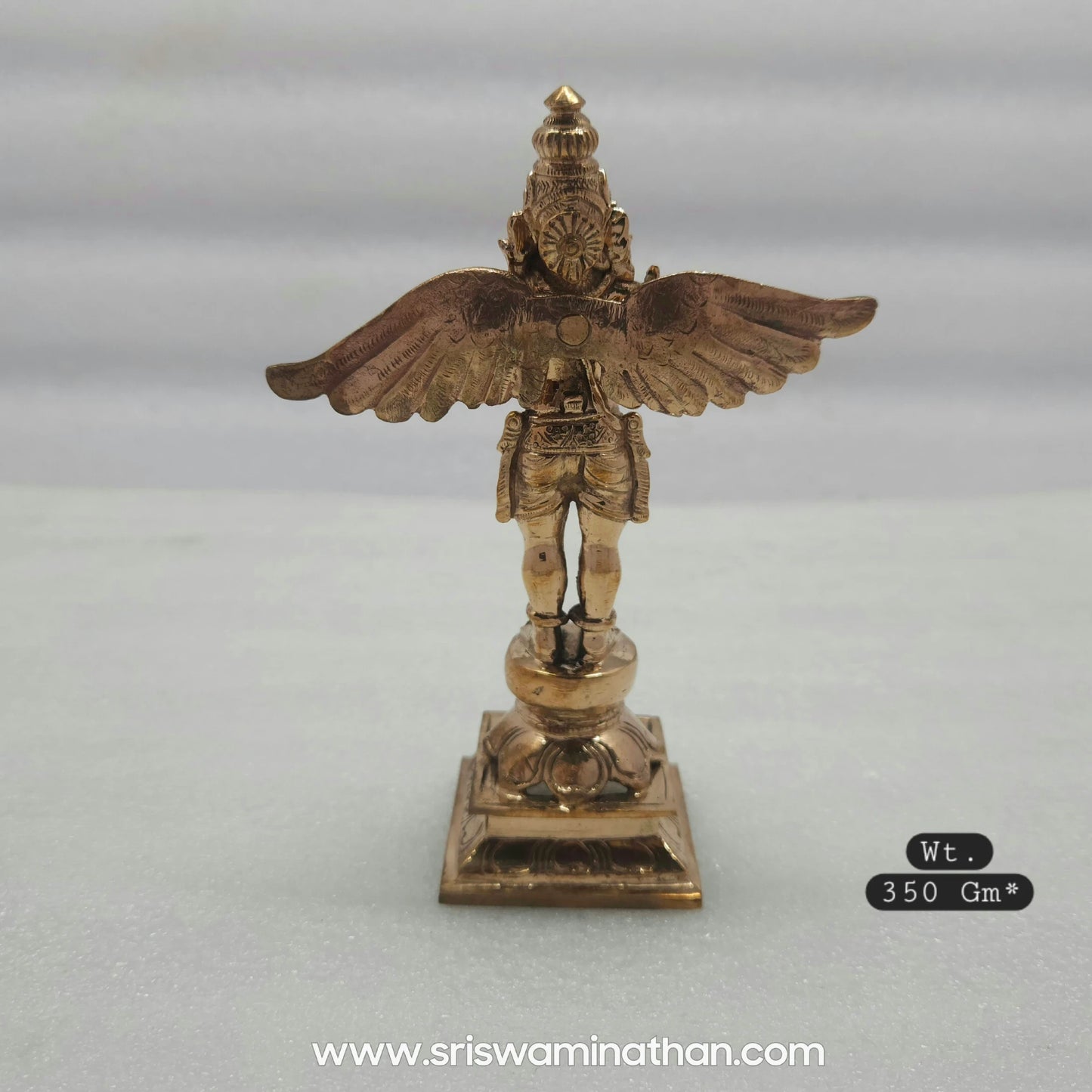 Back view of 5.5 inch Garuda Panchaloha Statue on tiered square pedestal — Panchaloha five-metal alloy, Sri Swaminathan & Co
