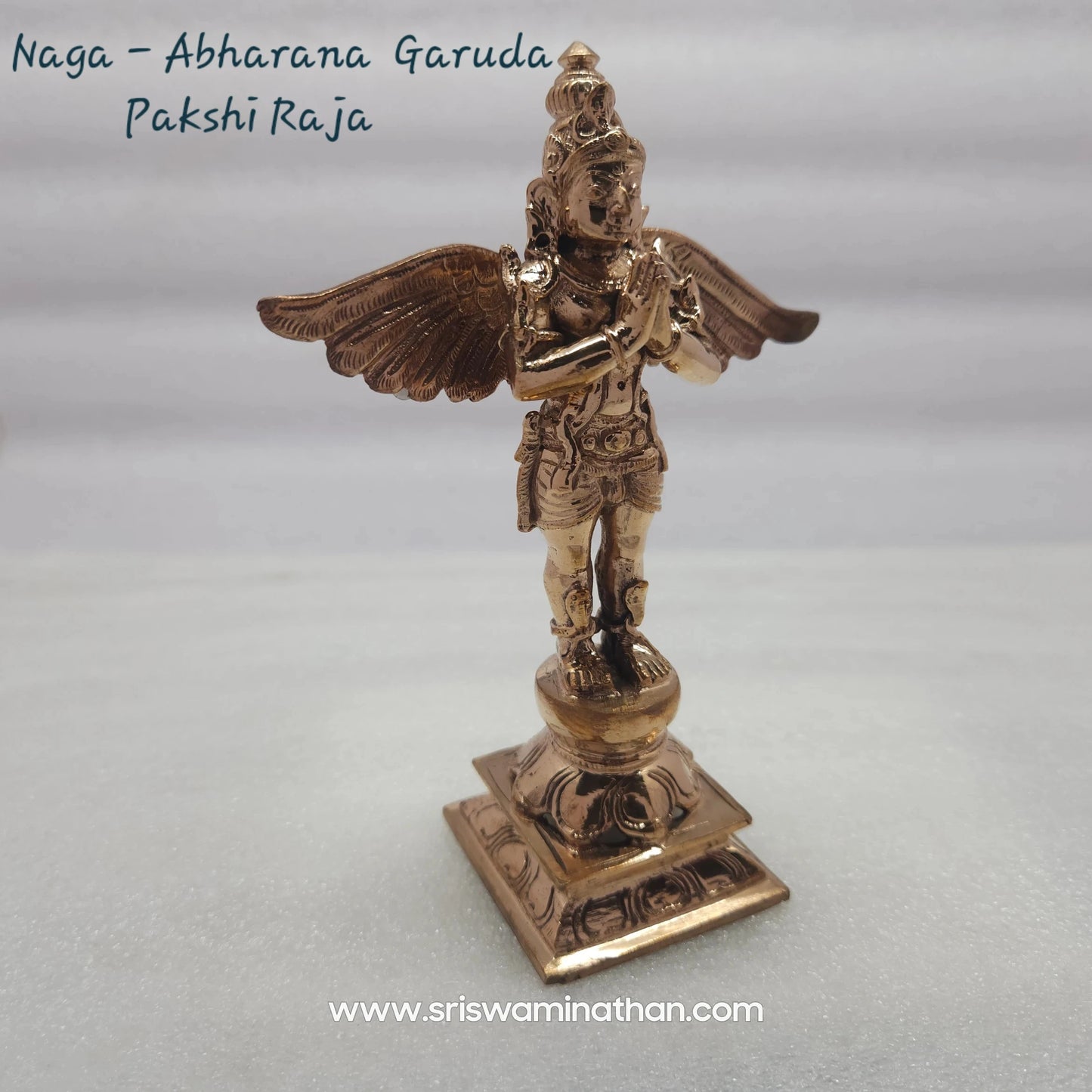 Nava Naga serpent ornamentation detail on 5.5 inch Garuda Panchaloha Statue — nine sacred serpents, Kumbakonam craftsmen

