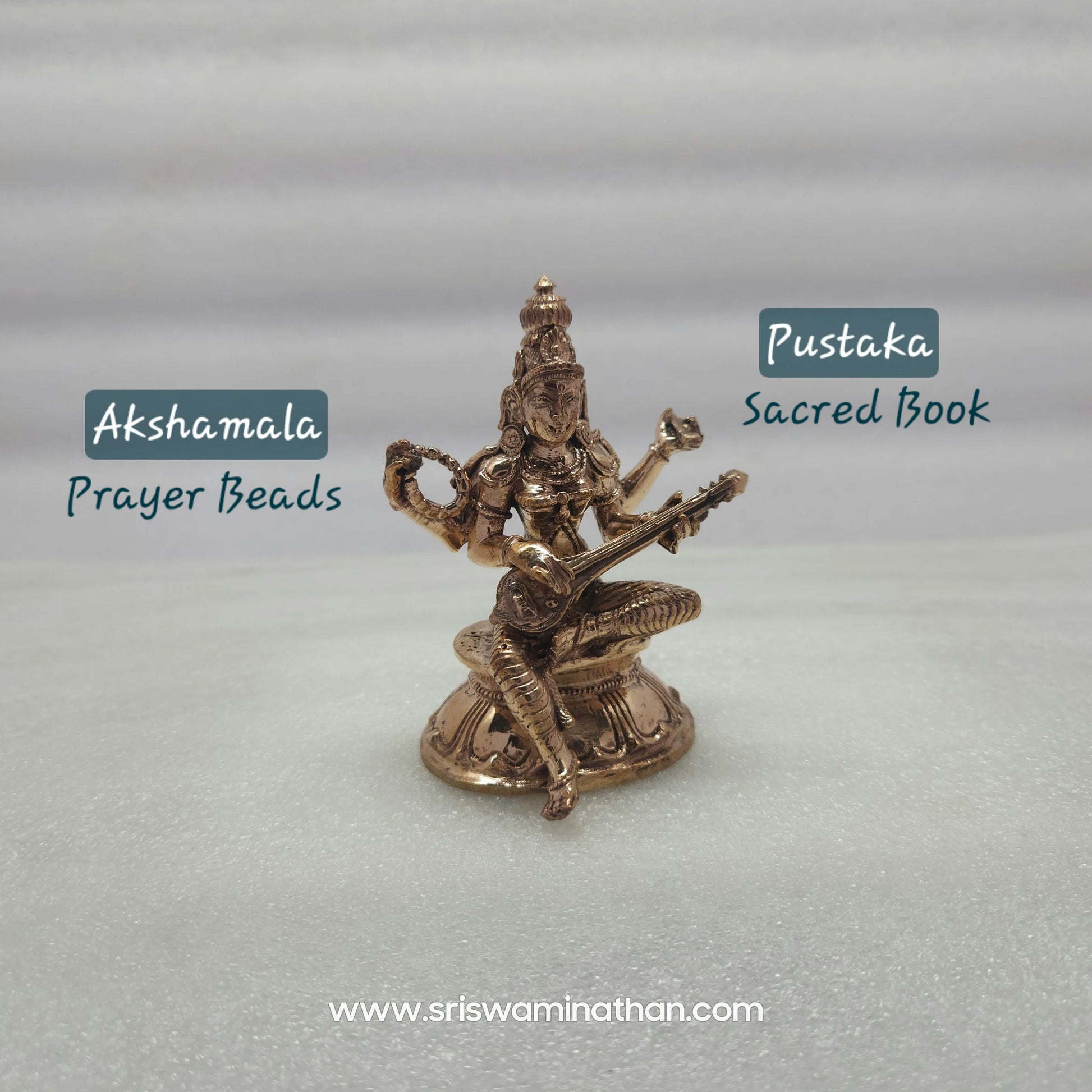 Side view of 3.5 inch Saraswati Panchaloha Statue showing four hands (Chaturbhuja) and lotus throne detail — Kumbakonam handcrafted
