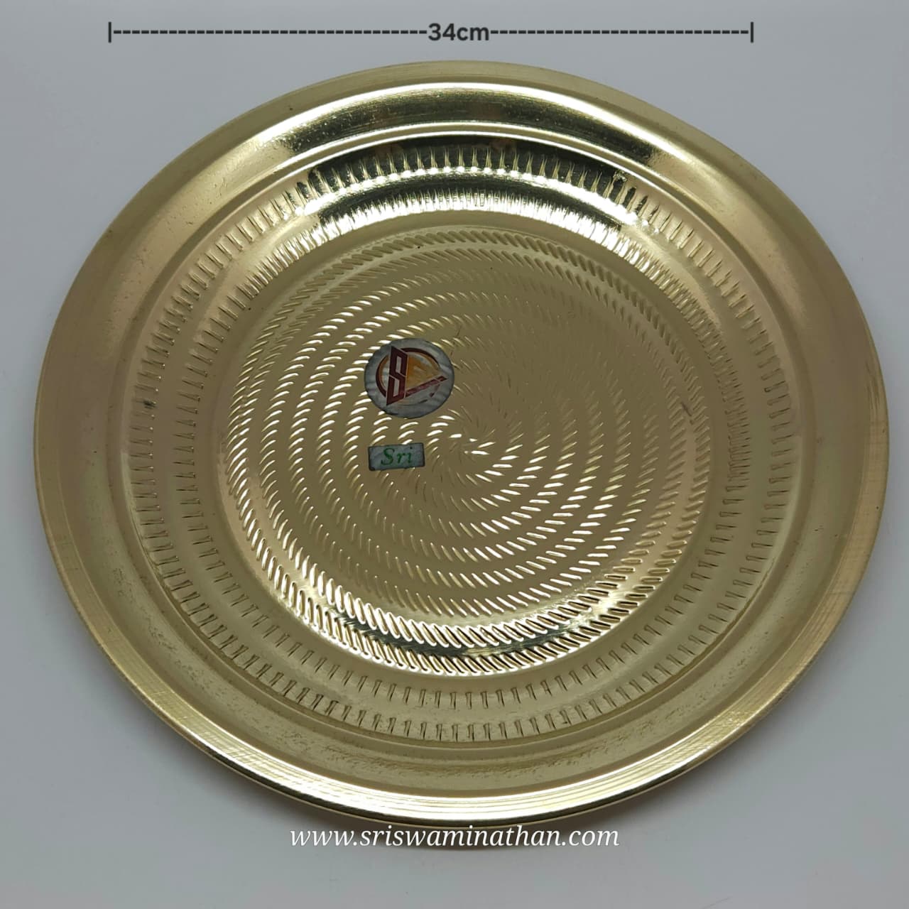 Polished 14-inch brass Thambalam plate with decorative engravings for temple rituals
