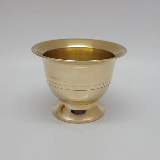 Close up front profile shot of a large size pure brass chandan pyali and gandham ginni cup highlighting the wide rim and pedestal base.