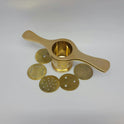Top down view of open solid brass sevanazhi cylinder highlighting the wide interior compartment chamber and jali molds.