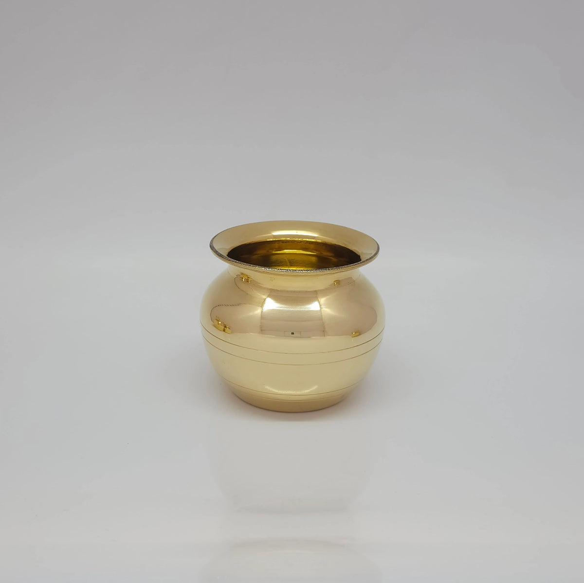  Multi-angle layout with the brass wealth pots turned upside down and sideways to showcase the thick metal base construction and clean hollow inside cavities.