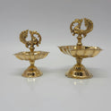 Two sizes of the pure brass peacock oil lamp shown from the front.