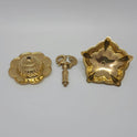 The flower base brass peacock lamp taken apart into three pieces to show how easy it is to wash.