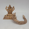 Studio breakdown shot displaying the pure Panchaloha Ganesha idol sitting alone on its square platform with the detailed horseshoe-shaped Prabhavali arch resting detached in front.
