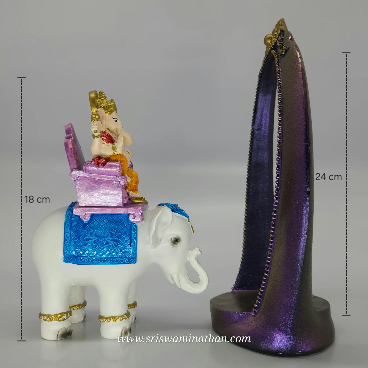 Side view showing the Ganesha on elephant piece completely pulled out next to the tall purple prabhavali frame.