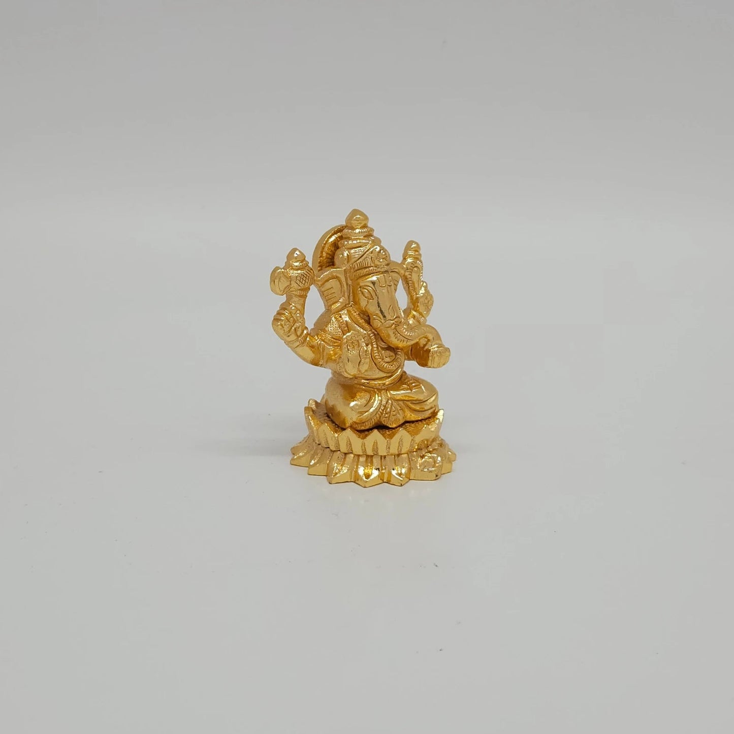 Left Thumbikai Round Lotus Base Crown Detail