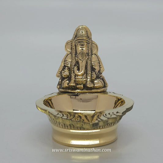 Ganesha brass lamp for Vinayagar Chaturthi and Sankashti Chaturthi - Traditional Tamil vilakku for festival worship
