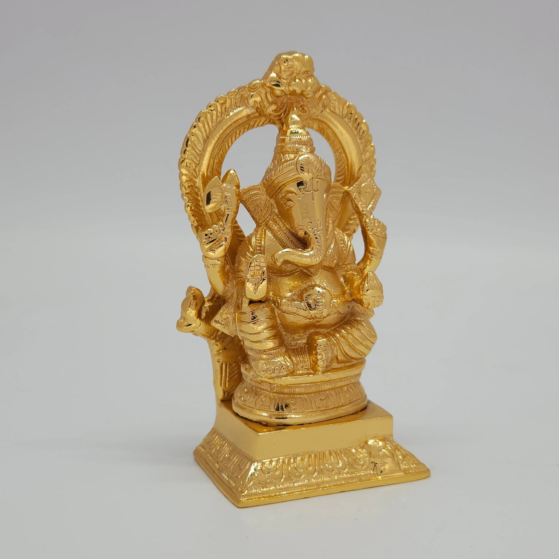 Ganpati Gold Murti Right Angle Prabhavali Arch Peetham Base Vamamukhi Trunk Solid Brass
