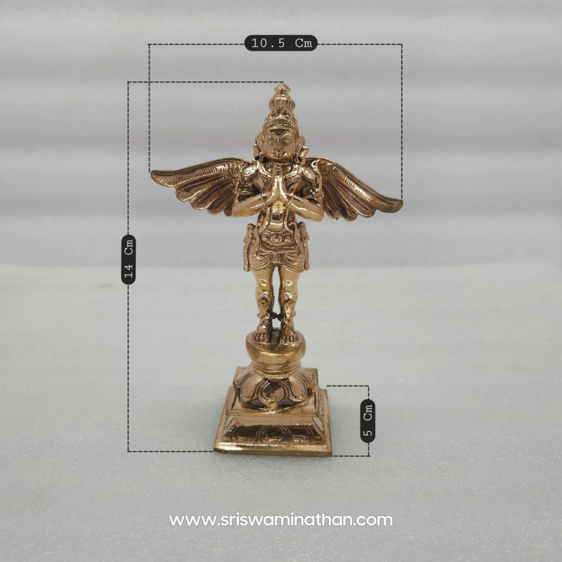 Detailed view of 5.5 inch Garuda Panchaloha Statue showing wing detail and Nava Naga ornamentation — Kumbakonam handcrafted
