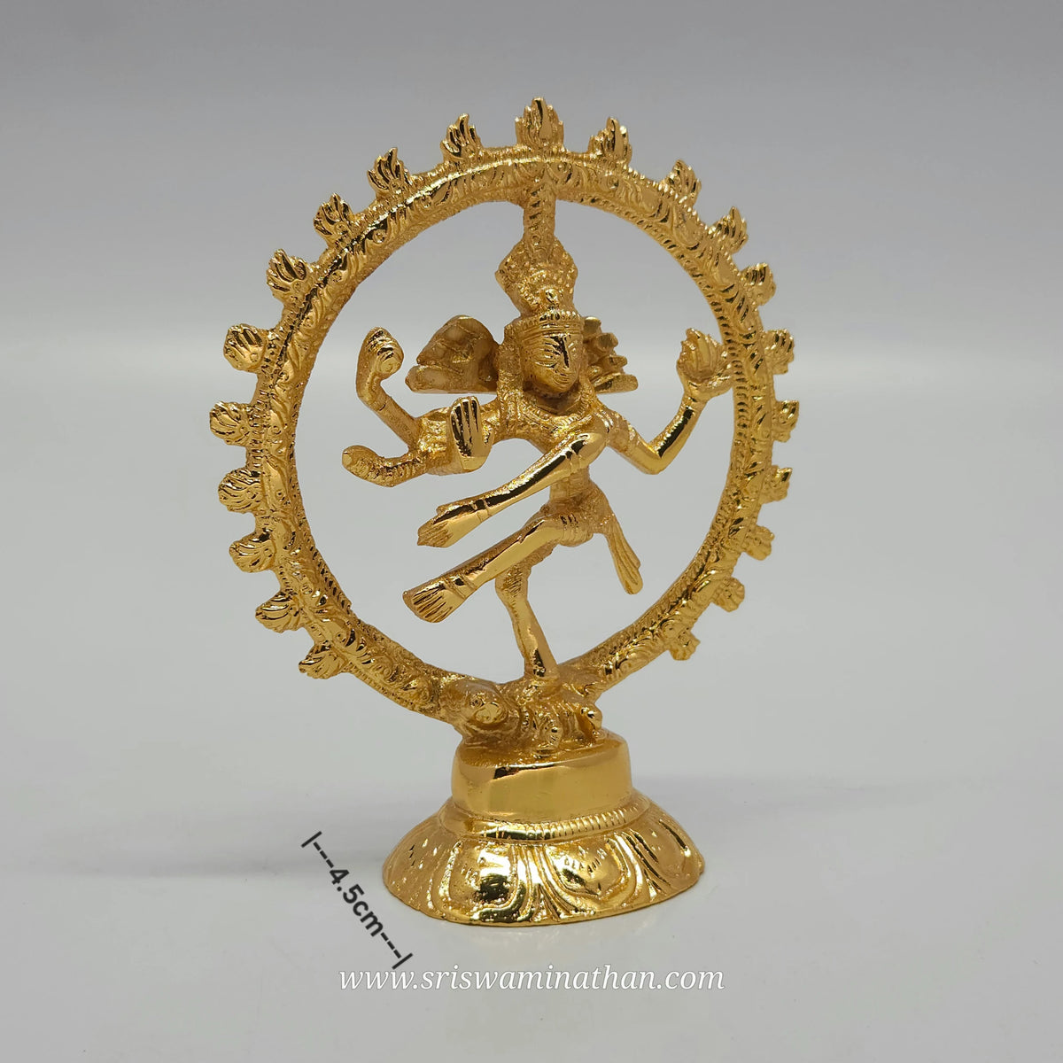Three-quarter angled perspective view of the glossy gold layered brass Nataraja idol showing the base layout depth measurement line of 4.5 cm