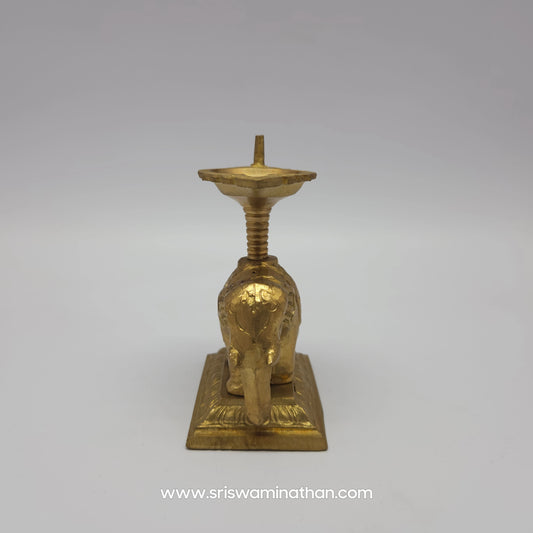 Direct rear back profile view of the solid brass elephant diya highlighting the symmetrical design and pedestal base stand.