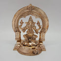 Front straight profile view of the 6.3 inch authentic Swamimalai Panchaloha seated Ganesha statue showing the detailed removable Prabhavali arch, lotus pedestal, and Mooshika mouse base from Sri Swaminathan and Co stock