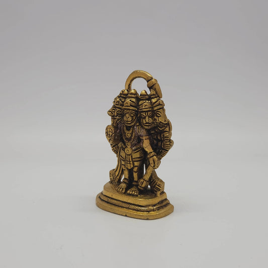 Left 45-degree angle profile emphasizing the multi-arm weapon layouts, Hanuman's side faces, and the detailed cuts around the base steps.