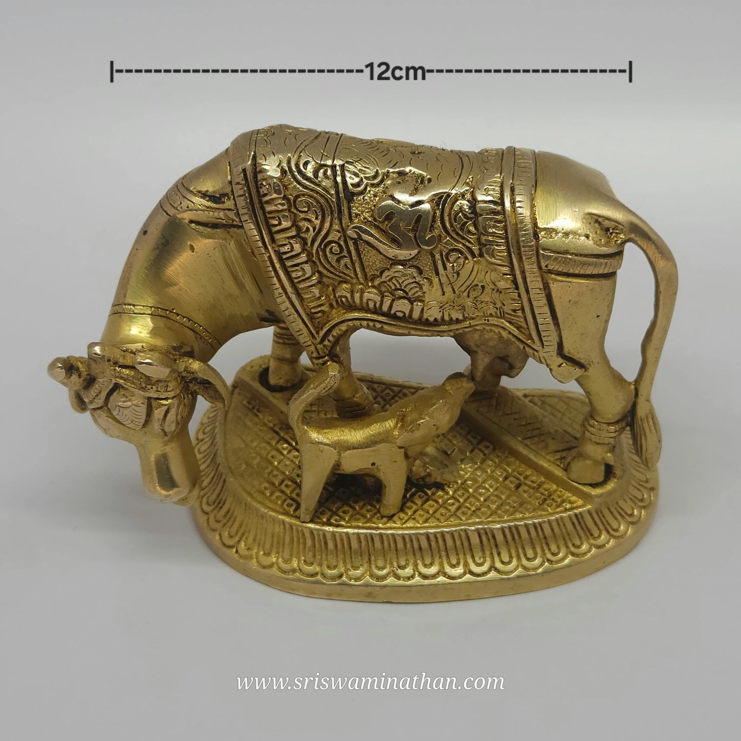 Sacred cow and calf Kamadhenu brass statue symbol of prosperity