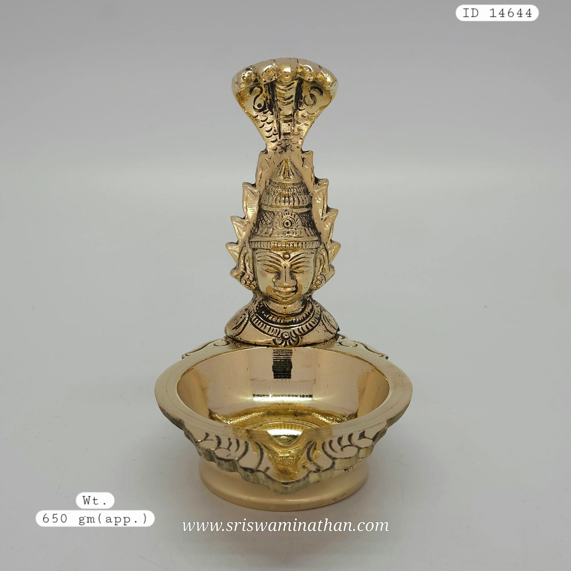 Detailed view of Nagavalli Vilakku showing serpent motif craftsmanship - Traditional brass lamp 650g weight