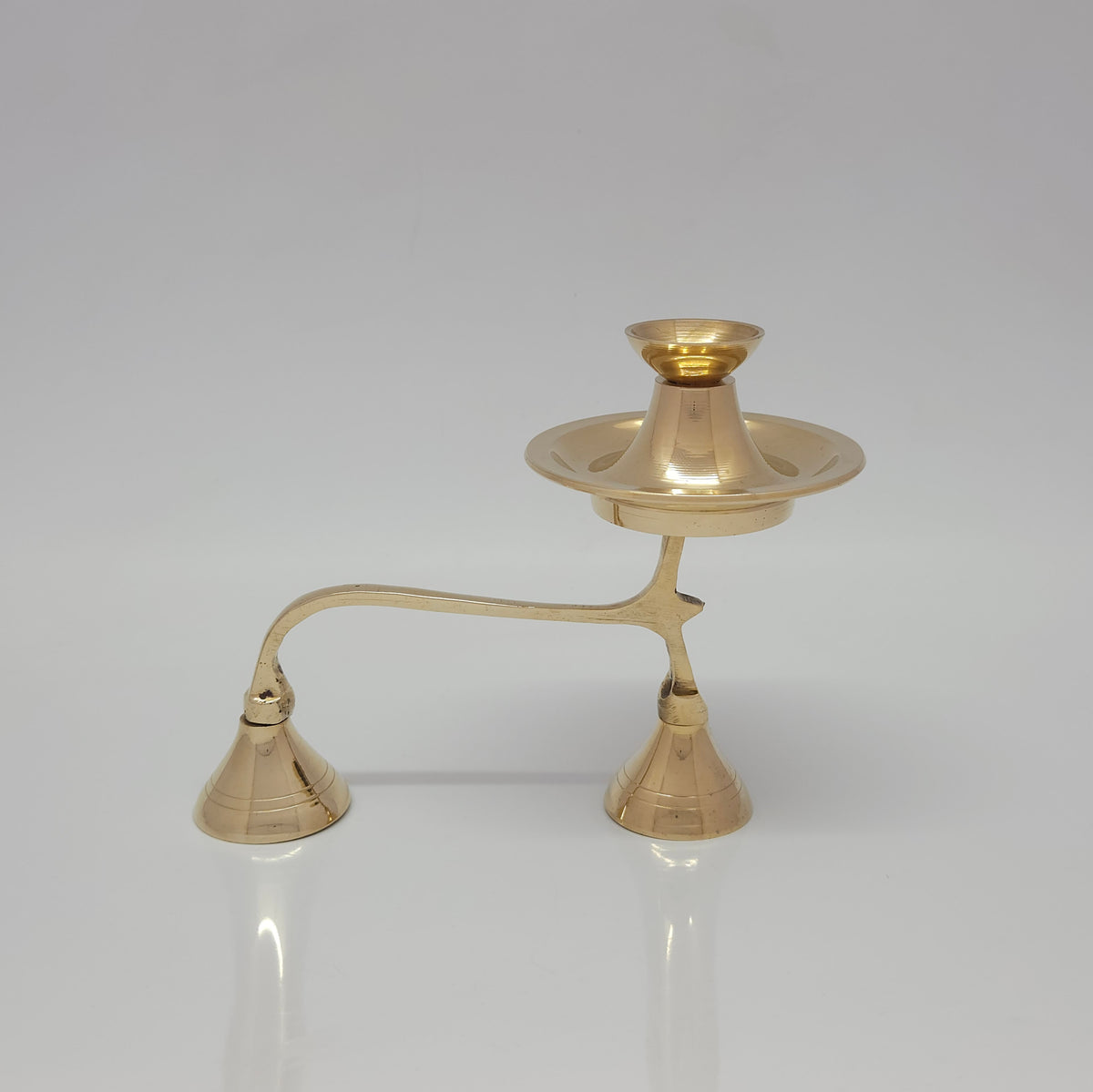 Profile view of the pure brass two-tier kapoor arati stand showing the exact ground clearance and the upper burning kumizh pillar of big size
