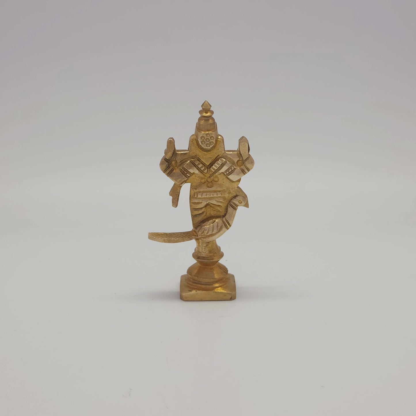 Rear view showcasing the detailed peacock tail feathers, back structure of the crown, and the authentic raw brass texture of the 50g small idol