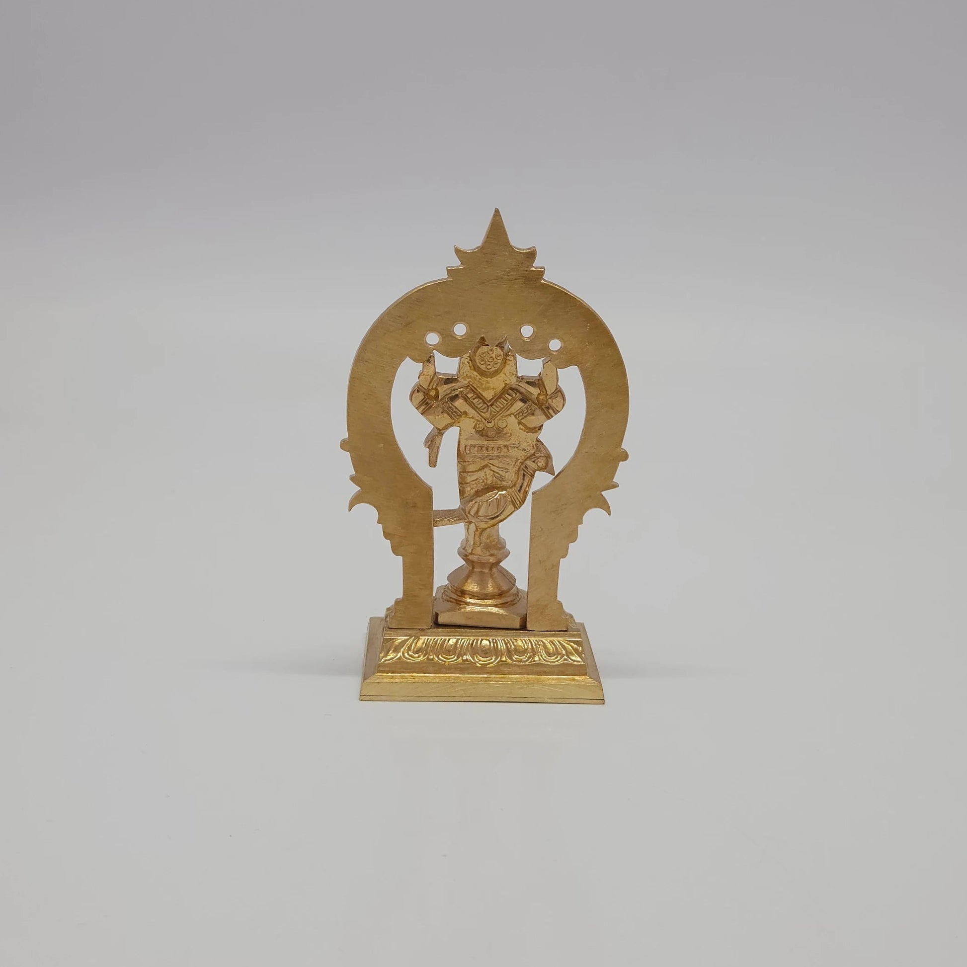 Rear view showcasing the solid back structure of the loop archway, the reverse pedestal lines, and the authentic raw brass texture of the 140g small idol.
