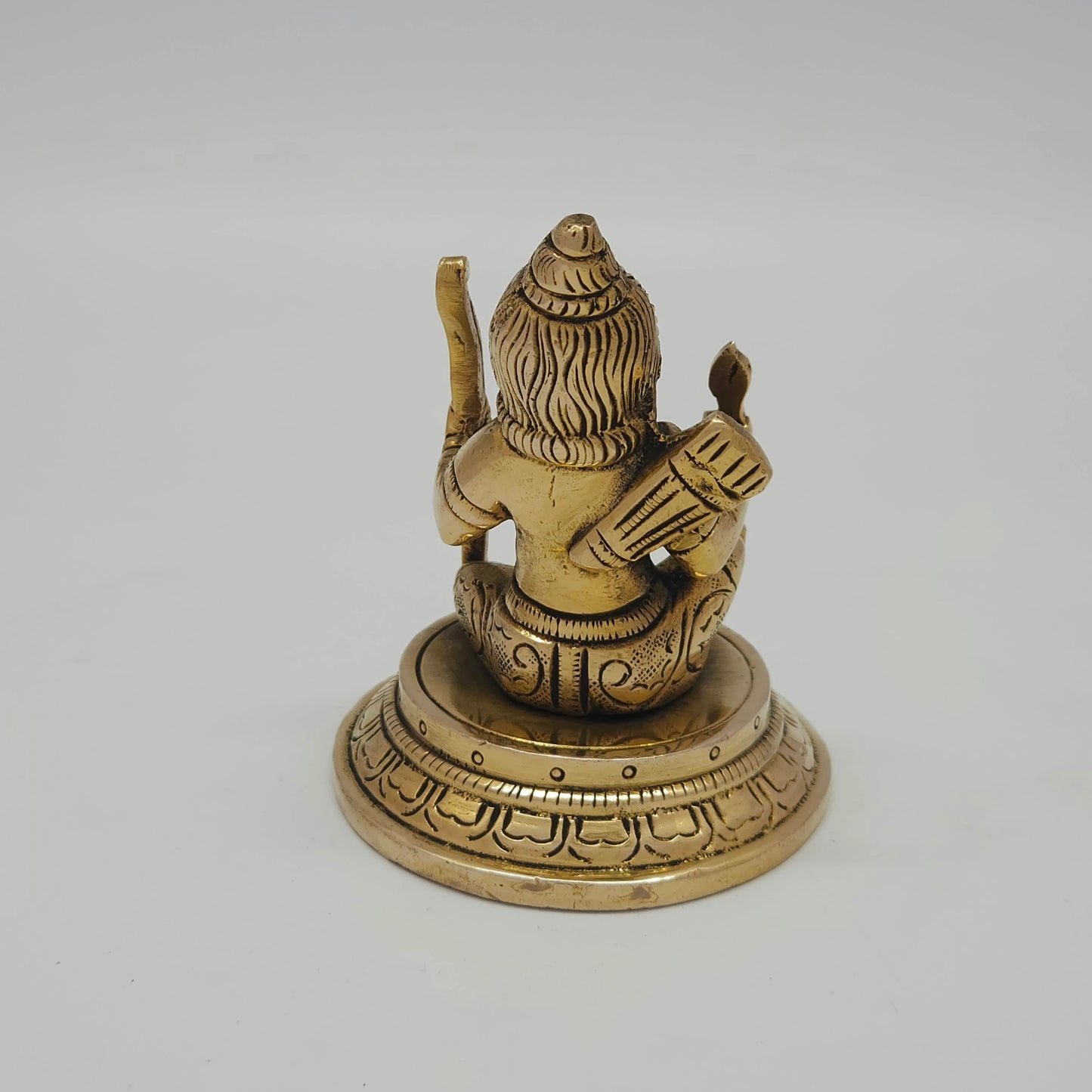 Rear view showcasing the solid back structure of the crown, the reverse pedestal lines, and the beautiful raw hand-polished antique texture of the 390g idol.