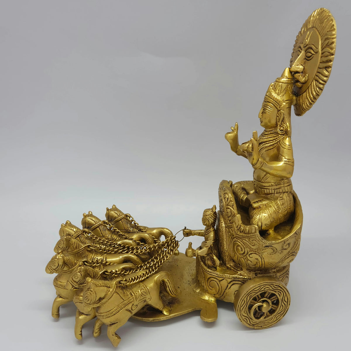 Flat left profile view highlighting the full temple-style architectural carvings, wheel details, and structural symmetry of the solid brass chariot