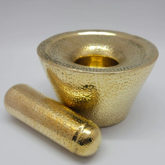 Flat straight front view of the open basin mouth of the handmade brass wedding Aatukkal wet grinder by Sri Swaminathan