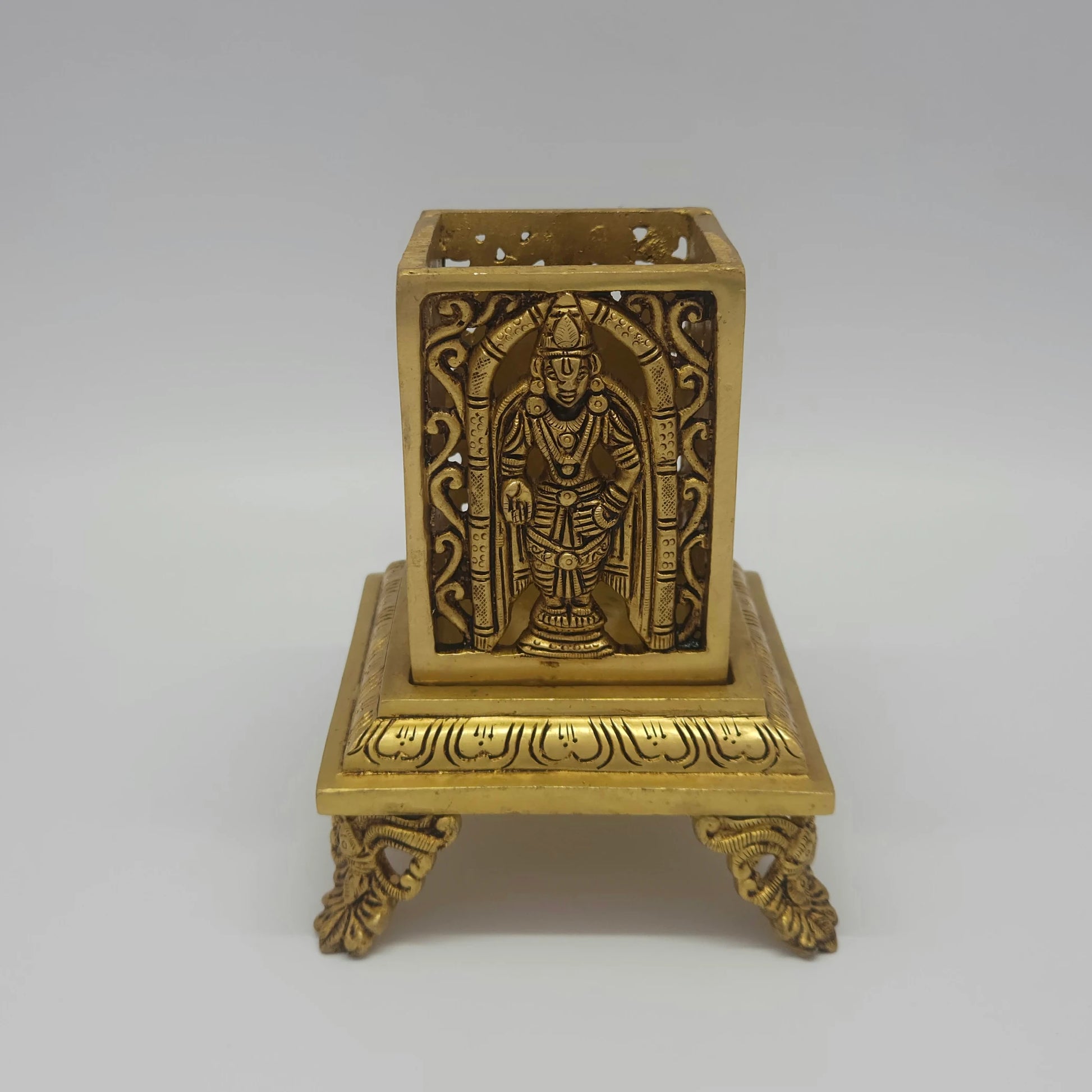 Flat straight view highlighting the standing icon of Lord Balaji Venkateswara beneath a traditional curved temple archway arch panel face.