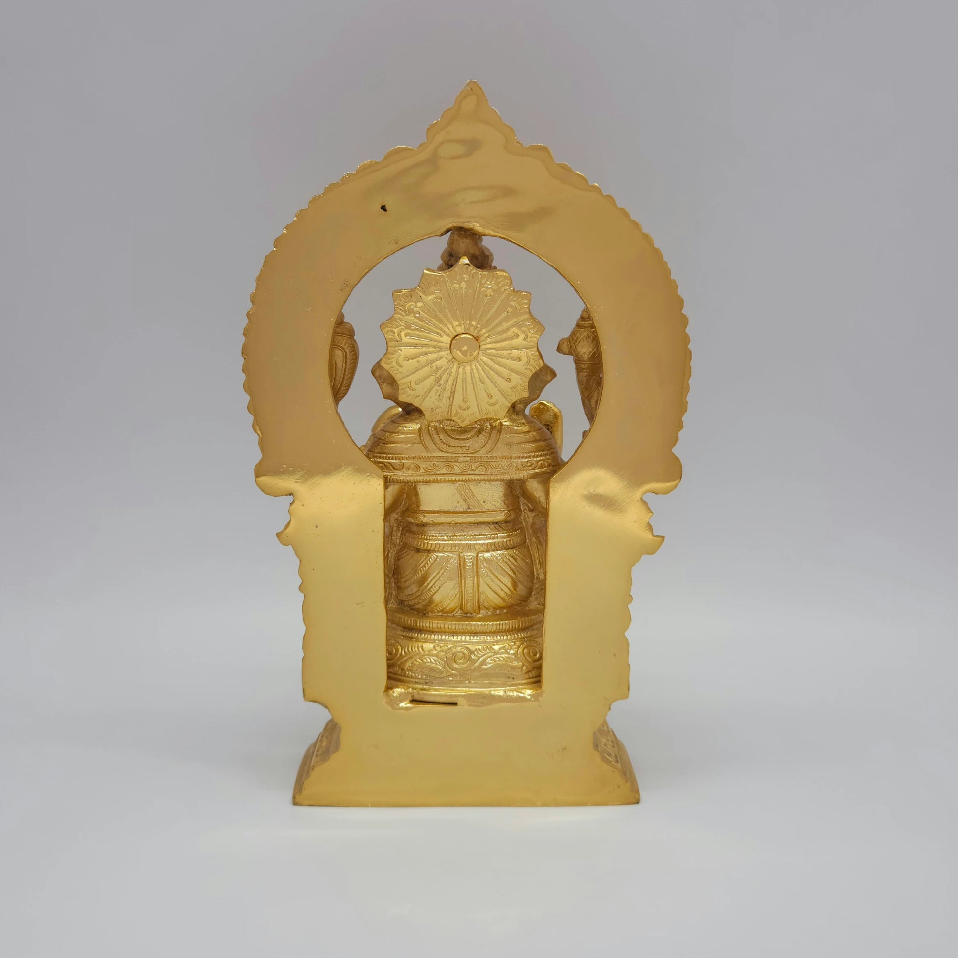 Rear view showcasing the solid back structure of the Prabhavali arch, the reverse crown lines, and the flawless mirror-gold luster of the 3.15kg showpiece.