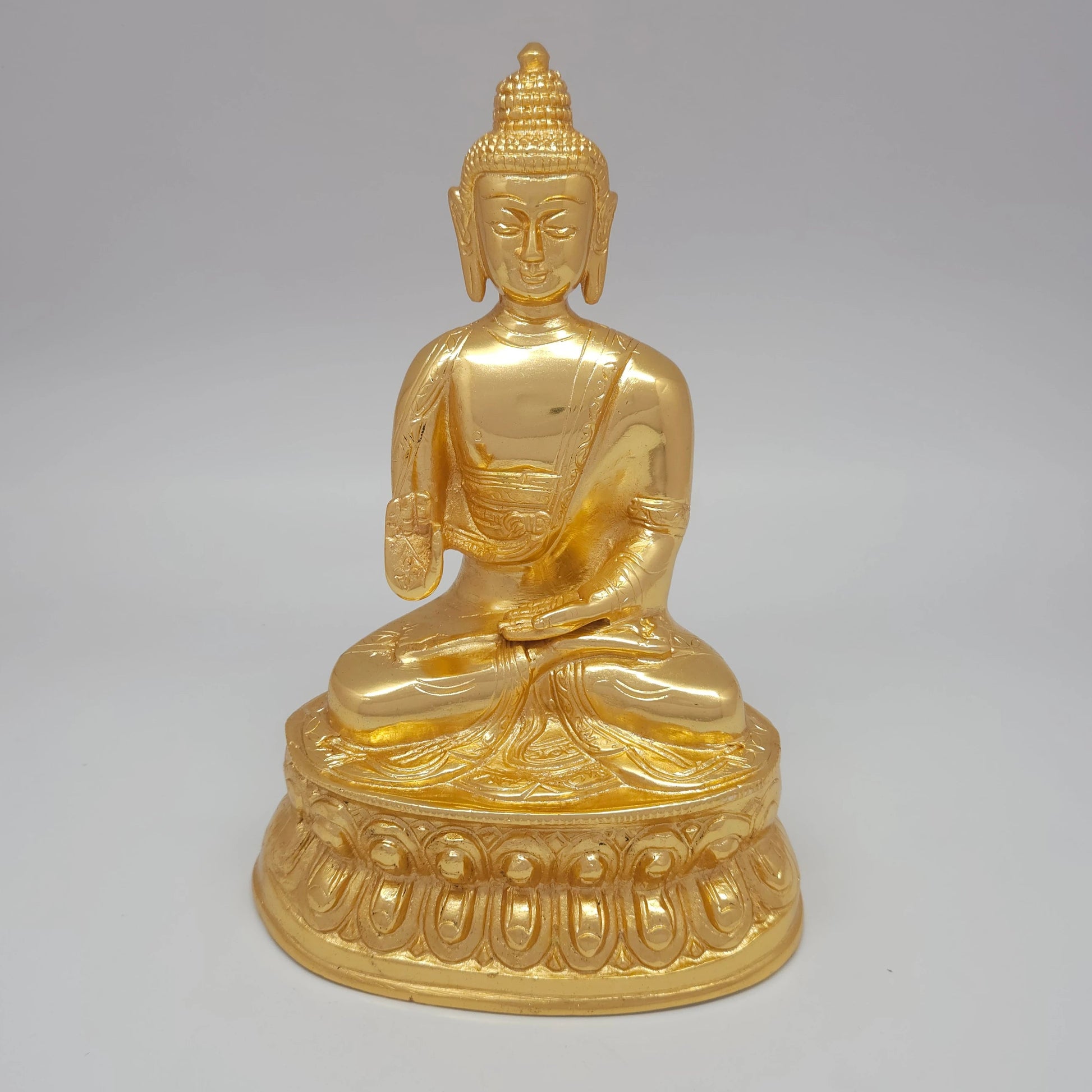 Front view of the 21.5cm / 8.5-inch premium gold powder-coated hollow brass Siddhartha icon highlighting the crisp teaching gesture for Buddha Purnima.