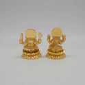 Rear view showcasing the detailed back engraving of the 5cm gold powder-coated decorative brass Ganesha statue from sriswaminathan.com