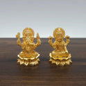 Front view of the 2-inch gold powder-coated brass Lakshmi Ganesha sitting lotus decorative figurine by Sri Swaminathan & Co