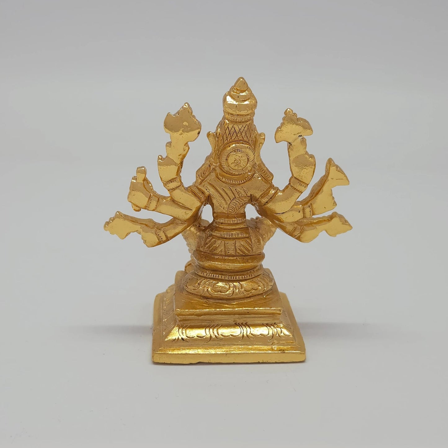 Rear view showcasing the solid back structure of the crown, the multi-arm weapon layouts, and the flawless mirror-gold luster of the 300g sculpture.