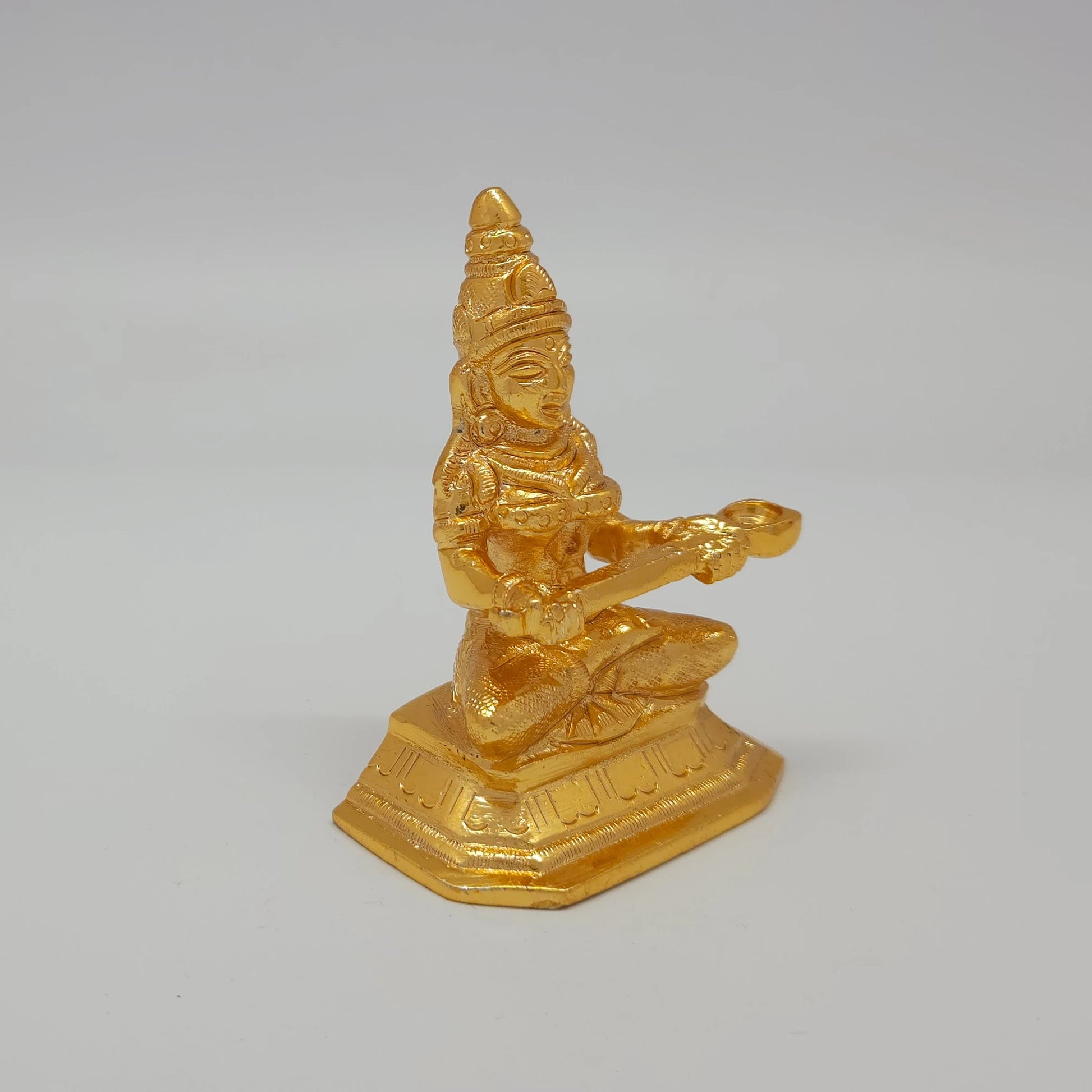 Premium Brass Goddess Annapoorani statue 3 inch 13cm 45-degree front right corner view focusing on octagonal base details
